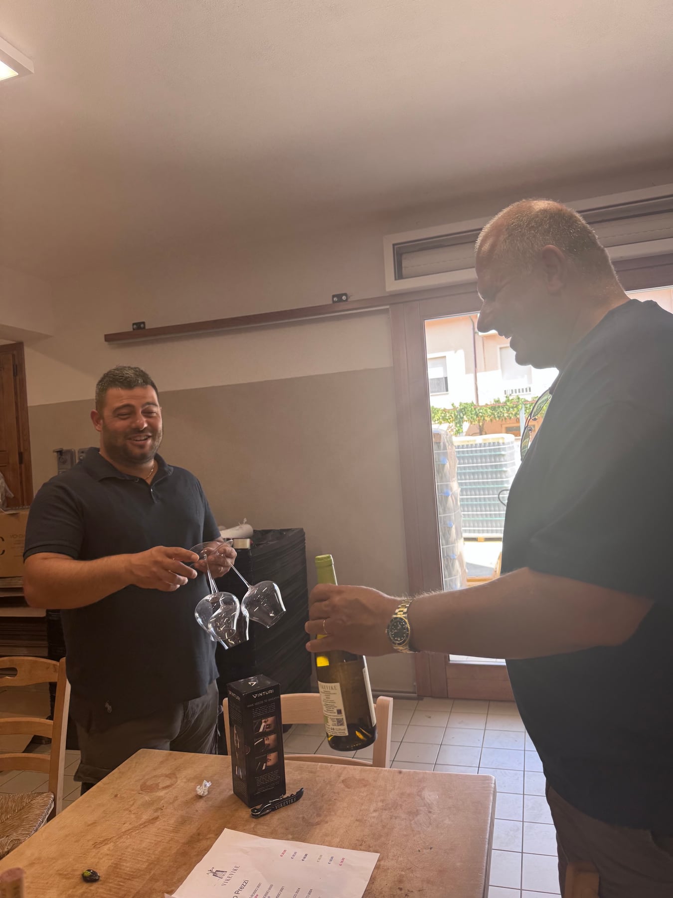 Simone and Yanni laughing together after the tasting